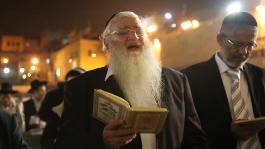 JERUSALEM, ISRAEL Ã¢â¬â SEP 18: Midnight prayers are reciting Slihot (penitential prayers) and imploring until Yom Kippur at the Western Wall, September 18, 2009.
