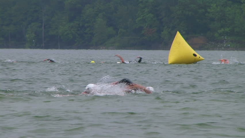 WAYNESVILLE - JULY 5: Swimmers (names withheld) from Ohio competing during the swim leg of the Ohio Challenge Triathlon held at Caesar Creek State Park July 5, 2009 in Waynesville, OH. 