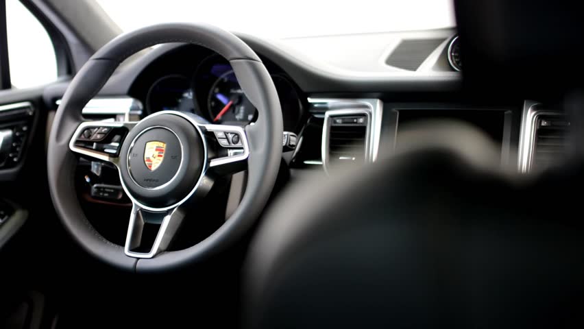 Prague Czech Republic Car Exhibition September 27 2017 Prague Czech Republic Car Exhibition September 27 2017 Dashboard Wheel And Detail Of Logo Seat Porsche Suv Macan Turbo Interior Stock Footage