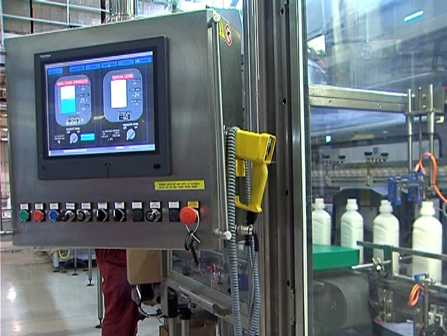Plastic bottles moving along the conveyor belt