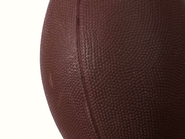 Football isolated on white slow motion close-up - NTSC