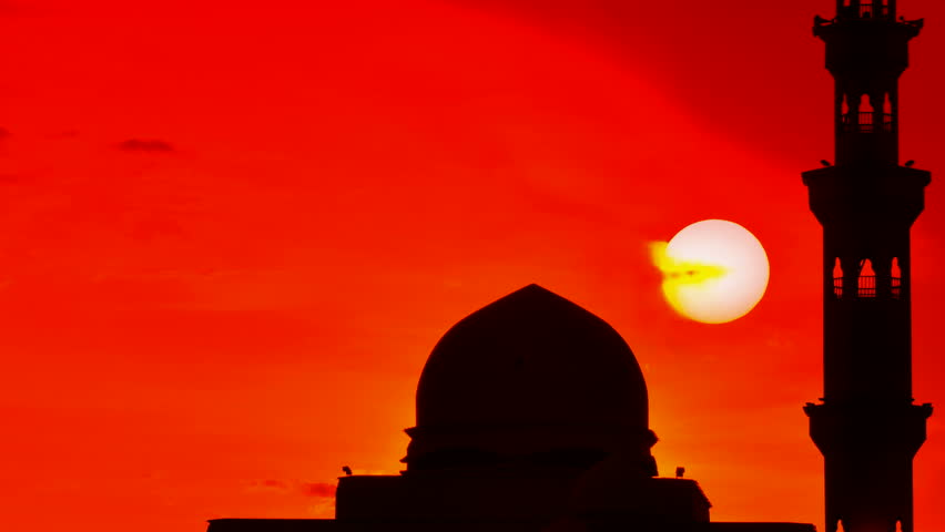 Silhouette of a mosque. Beautiful sun setting at Floating Mosque, Terengganu, Malaysia. 