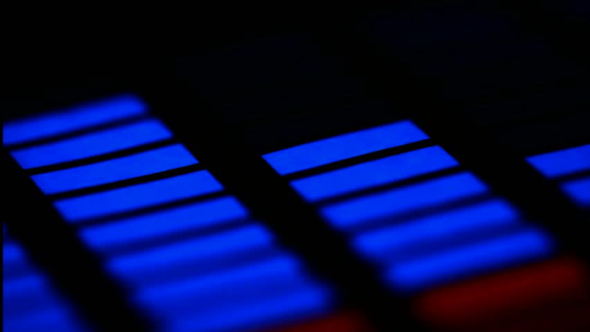 LED blue and red bars of audio spectrum analyzer for music visualization blink in dark 