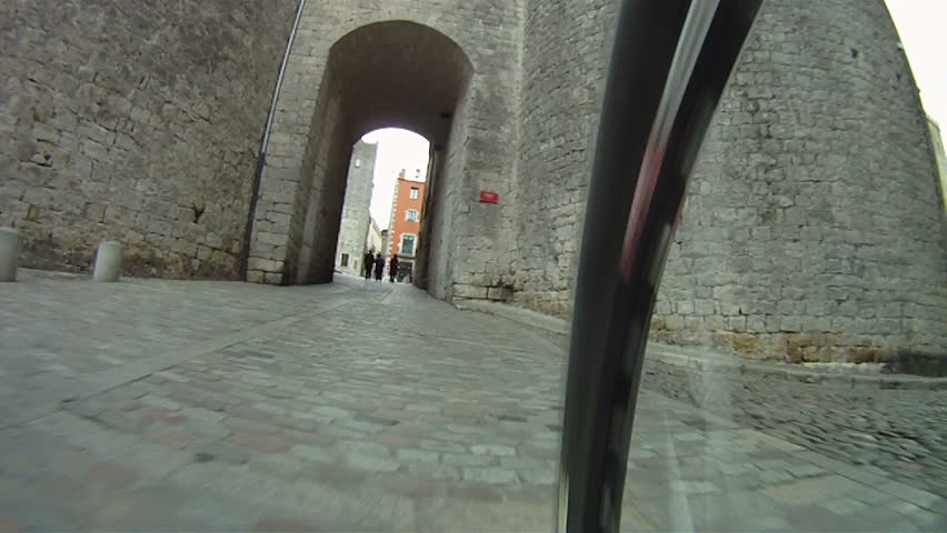 Mountain Bike ride along cobbled street