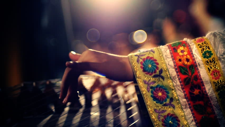 Chinese girl playing the national instrument