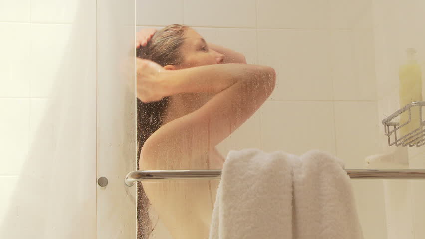 Portrait Of Woman Washing Hair In Shower Stock Footage Video 823621