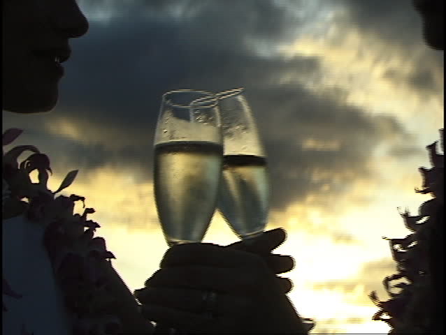 Camera zoom on champagne glasses