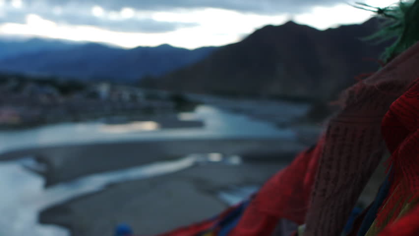Prayer flags in the mountains of Tibet: de-focused 