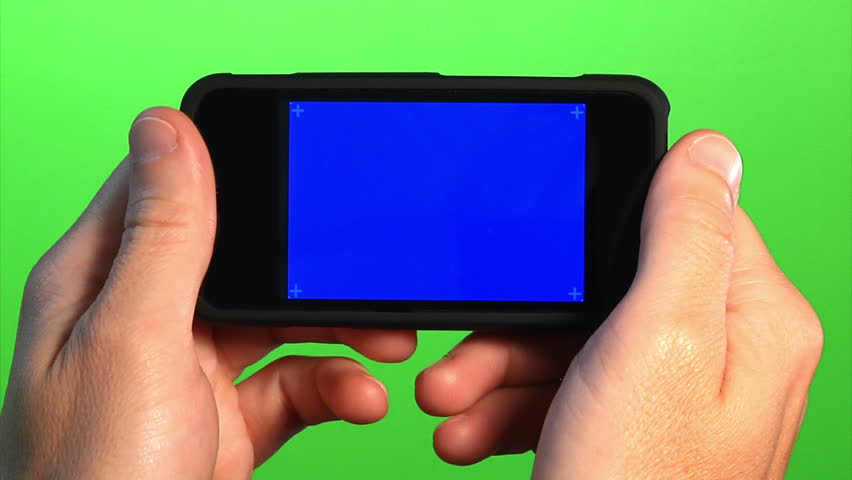 Holding a portable media player.  Green screen for your custom background, and a blue screen for your custom video content.  Blue screen has corner has marks for advanced tracking.  