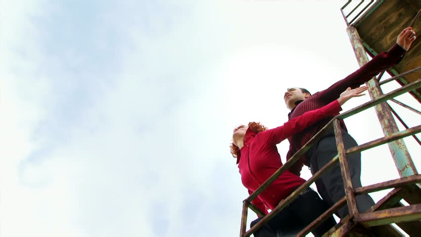 Flightplan at a height. The man and woman feel the illusion of flight at altitude.