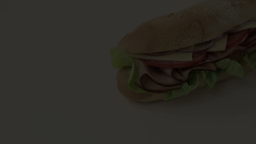 Giant ham, tomato, lettuce, cheese and onion sub ready to serve. 