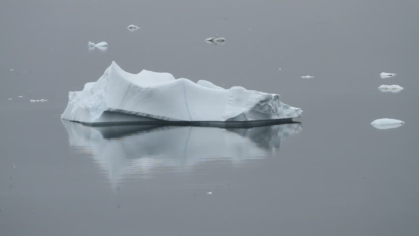 Iceberg lying in calm waters