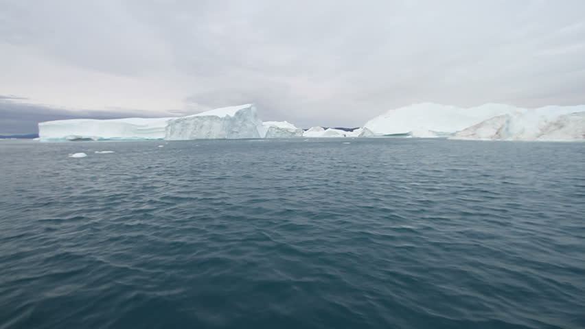 Sailing in the famous Ilulissat icefjord in Greenland. The icefjord is on UNESCO's World Heritage List.