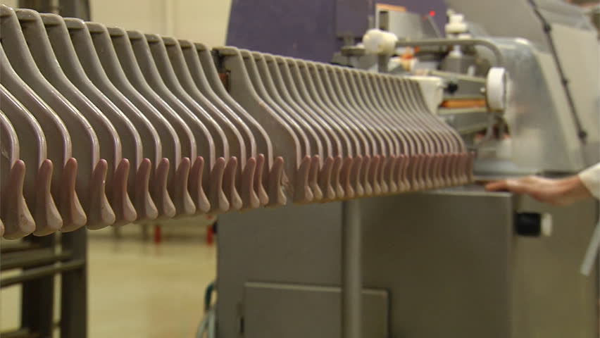 making sausage in a factory 