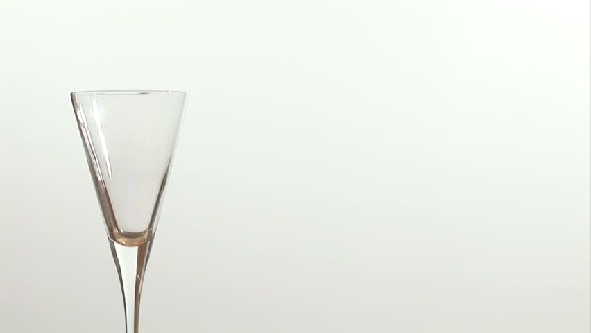 Glass of Champagne Being Poured