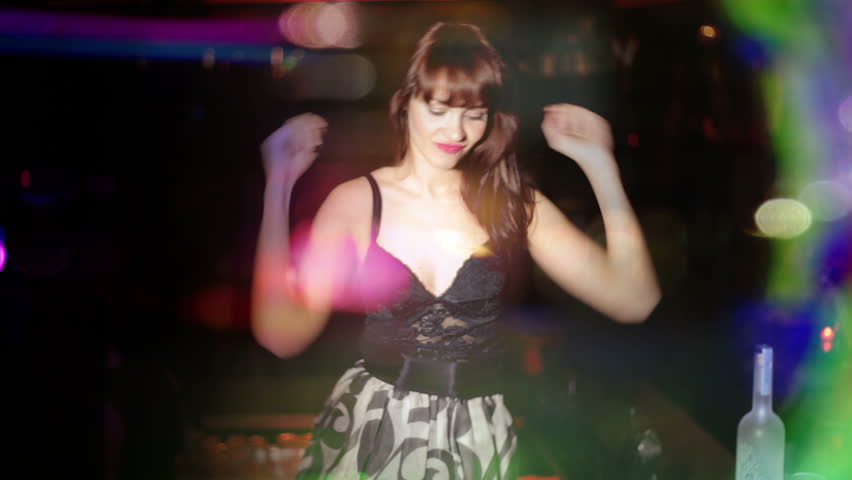 beautiful classic pinup girl in a  VIP club dancing