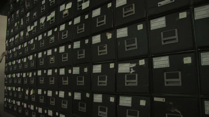 Man at File Cabinet 2