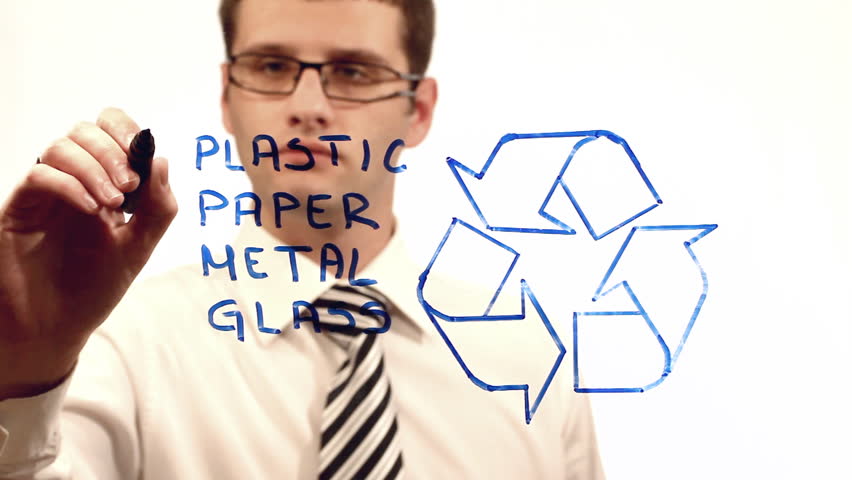 Businessman checking materials for recycling