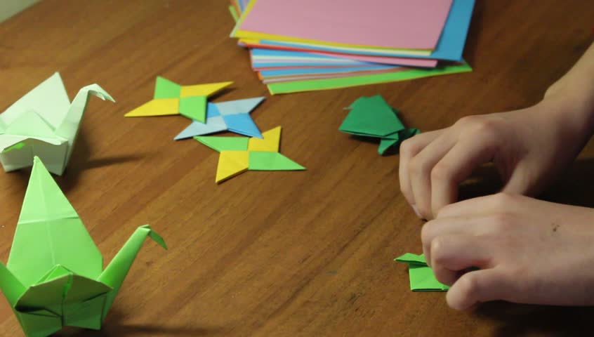 Hands Of Child Folding Origami Stock Footage Video 100 Royalty Free 10022972 Shutterstock