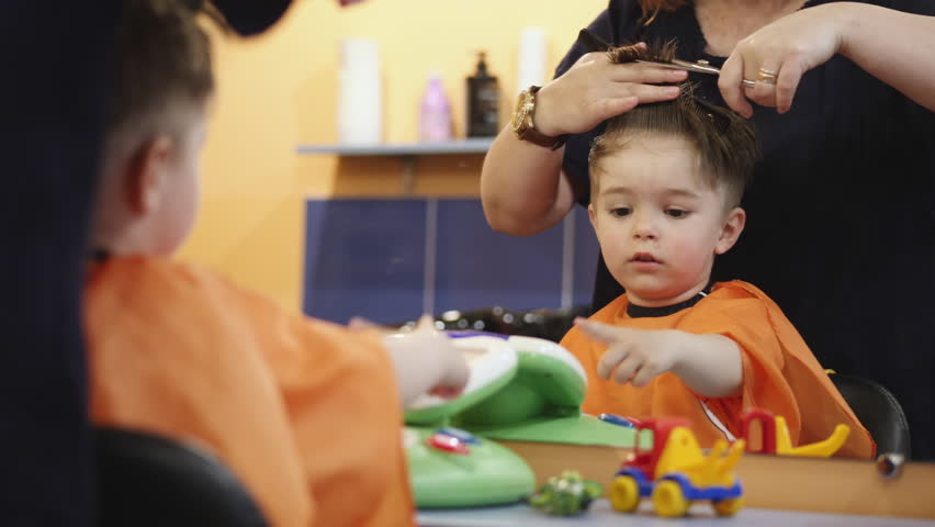 Child Hairstyle Hairdresser Working With Stock Footage Video 100