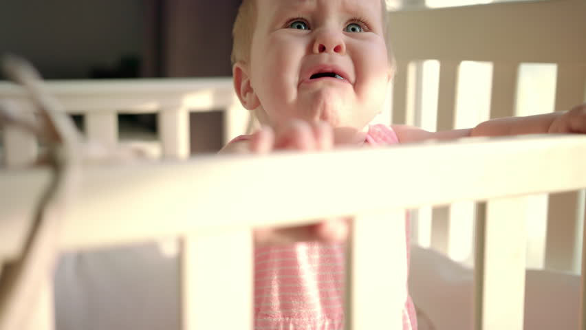 Sad Baby Crying In Cot Stock Footage Video 100 Royalty Free