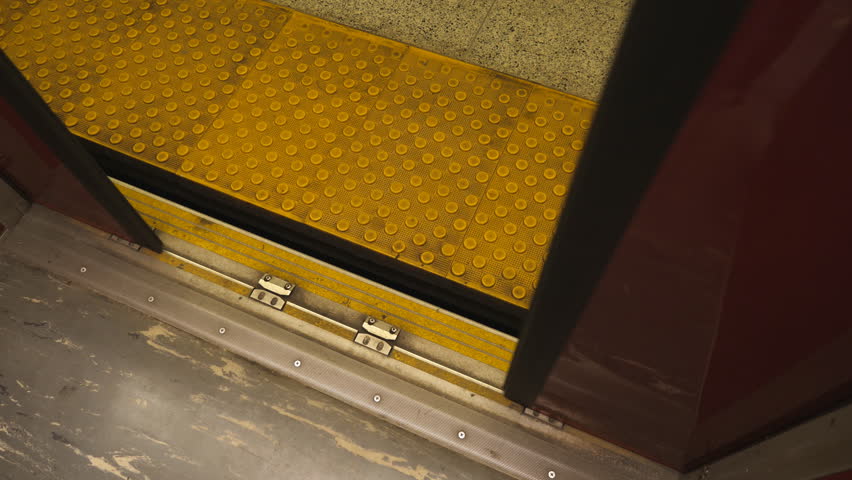 Passenger Pov View Of Yellow Platform And Red Subway Car Door