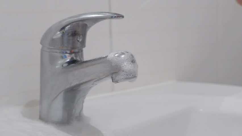 Spraying Of Chromed Bathroom Faucet Stock Footage Video 100