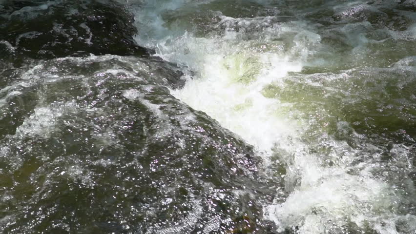 Rapidly flowing water cascading down rocks image - Free stock photo ...