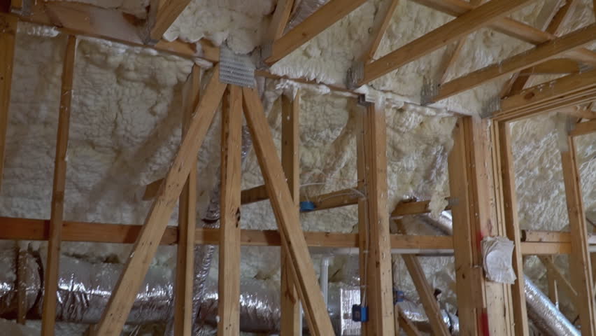 Termal Insulation Installing At The Attic Insulation The House