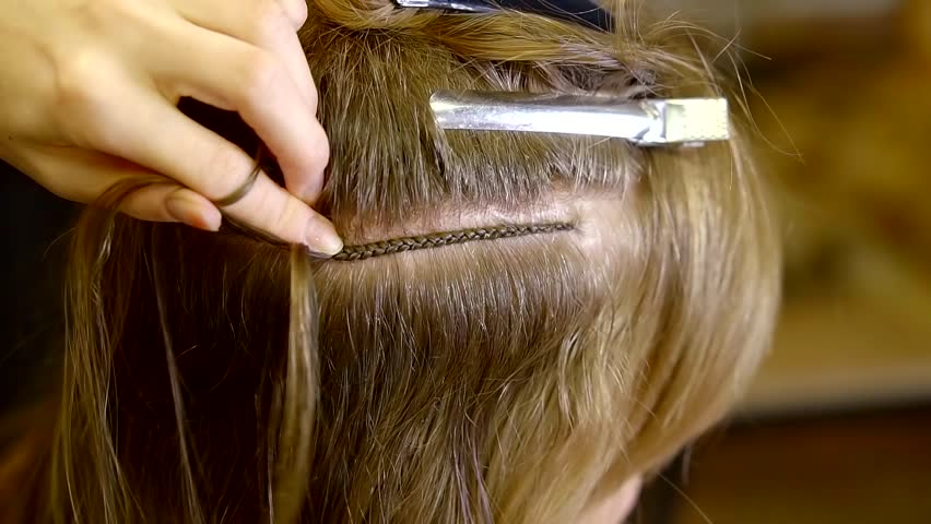Hd00 30close Up Hands In Hair Extensions To Weave A Thin Braid