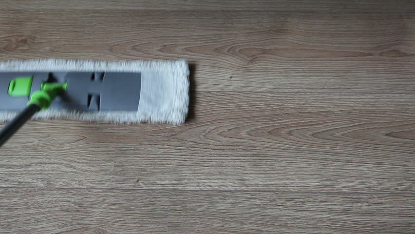 Damp Cleaning In The Apartment Stock Footage Video 100 Royalty Damp Cleaning In The Apartment Mistress Mops Wipes A Floor From Dust