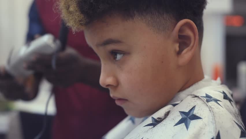 Hd00 12boy In The African Barbershop Cute Mixed Boy Makes A