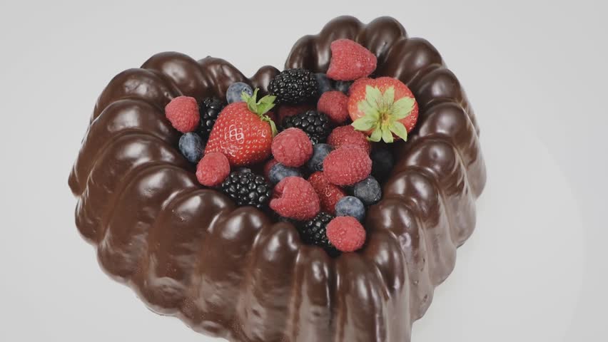 Bundt Cake Filled With Strawberry Blueberry And Blackberry Heart