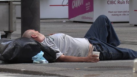 Toronto, Ontario, Canada April 2019 Homeless Person the Streets Of Wealthy Financial District