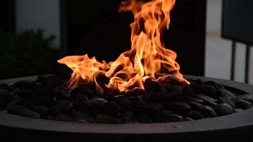 Flames Swaying In A Decorative Outdoor Fire Pit