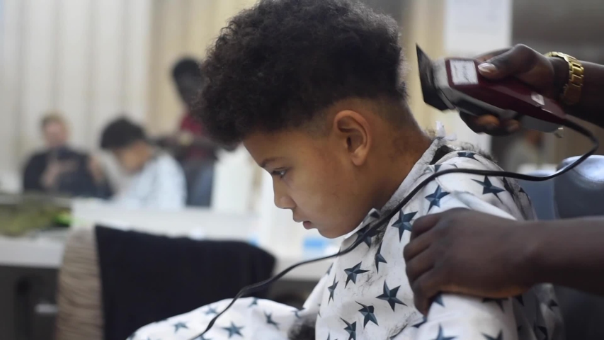 Hd00 06boy In The African Barbershop Cute Mixed Boy Makes A