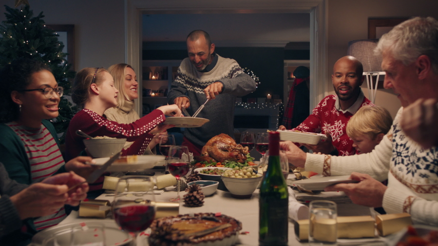 Family Christmas Dinner Man Cutting Stockvideos Filmmaterial
