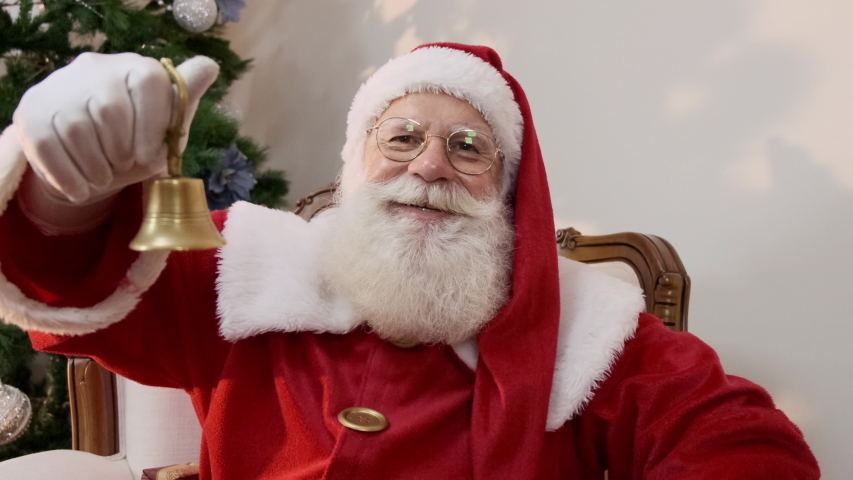 Santa Claus Ringing A Small Stock Footage Video 100 Royalty