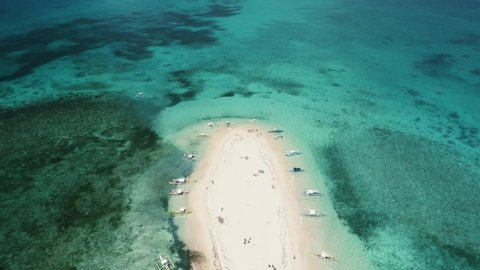 480px x 270px - 4k aerial drone footage of a remote sandbar in an exotic paradise with many  tourists and travelers enjoying it. surrounded by blue water and boats  naked island siargao philippines
