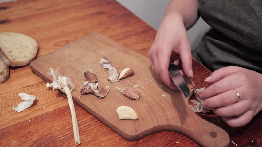 Hands Peeling Garlic with knife image - Free stock photo - Public ...