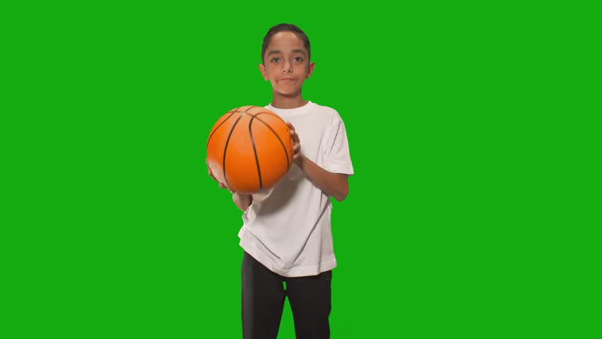 Stock Video Clip of Young boy on chroma key playing sports | Shutterstock