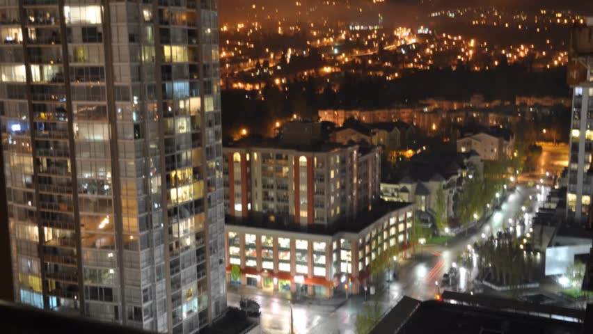 Apartment Building At Night time lapse of apartment building at night -tilt down- stock Apartment Building At Night time lapse of apartment building at night -tilt down- stock