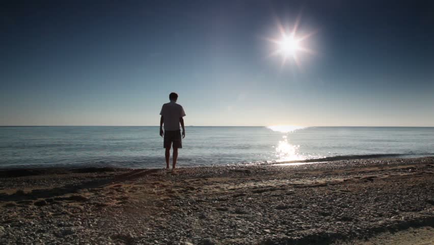 Person Looking Out At The Ocean On Sunny Day In The Pacific Northwest ...