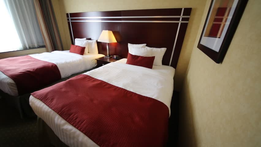 Two Beds With White Linens Stock Footage Video 100 Royalty Free 12742202 Shutterstock
