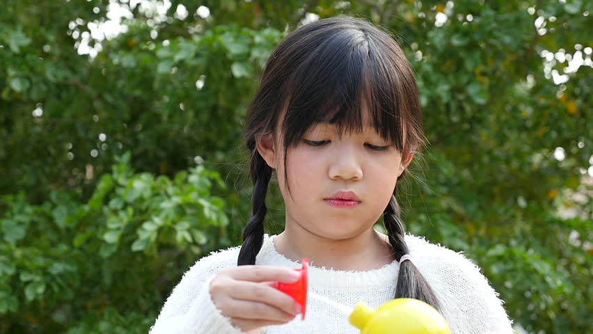 Watching outdoor bubble asian
