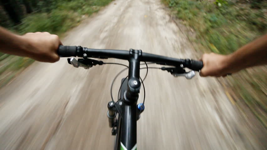 Speed Riding Downhill A MTB Bike On Rocky Mountain. View From First ...