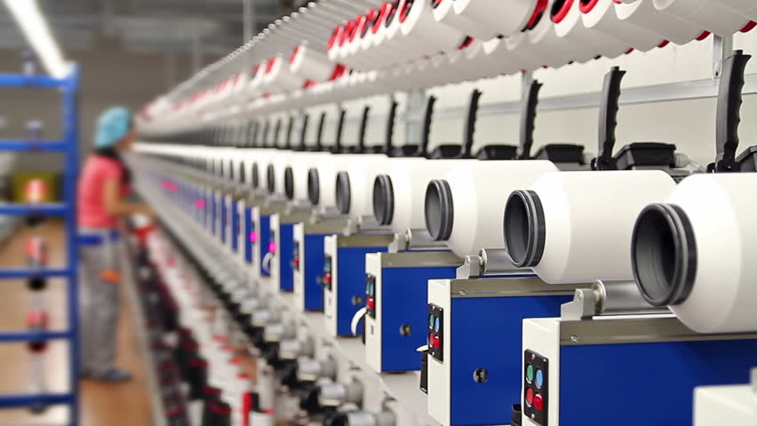 Textile Fabric Manufacturing MachineS In Work. Woman Working In Factory ...