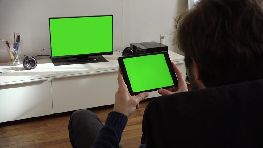 Watching Television Green Screen At Home. Young Man Watching A ...