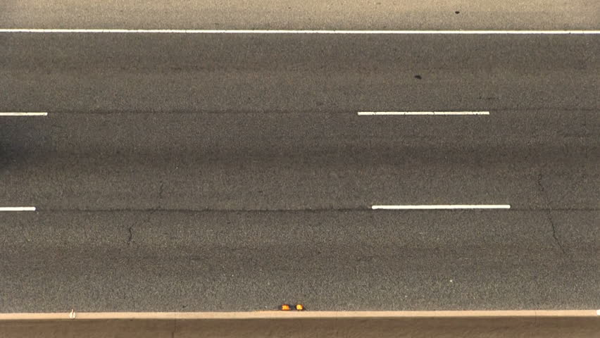 One Direction Traffic Three Lane Road From Above And Side
 - HD stock video clip