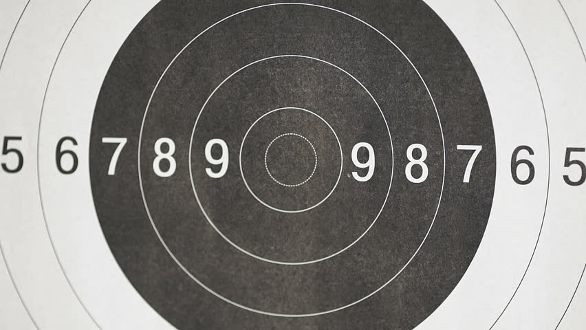 Single Target Bullseye Shot By A Handgun At A Shooting Range.(with ...